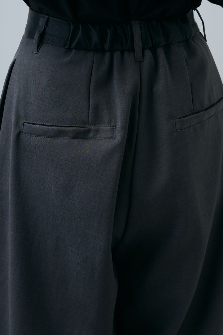 [予約/SET]アシンメトリーフレアーノースリーブブラウス+フェイクレザーベルトセンタータックパンツ(2set)