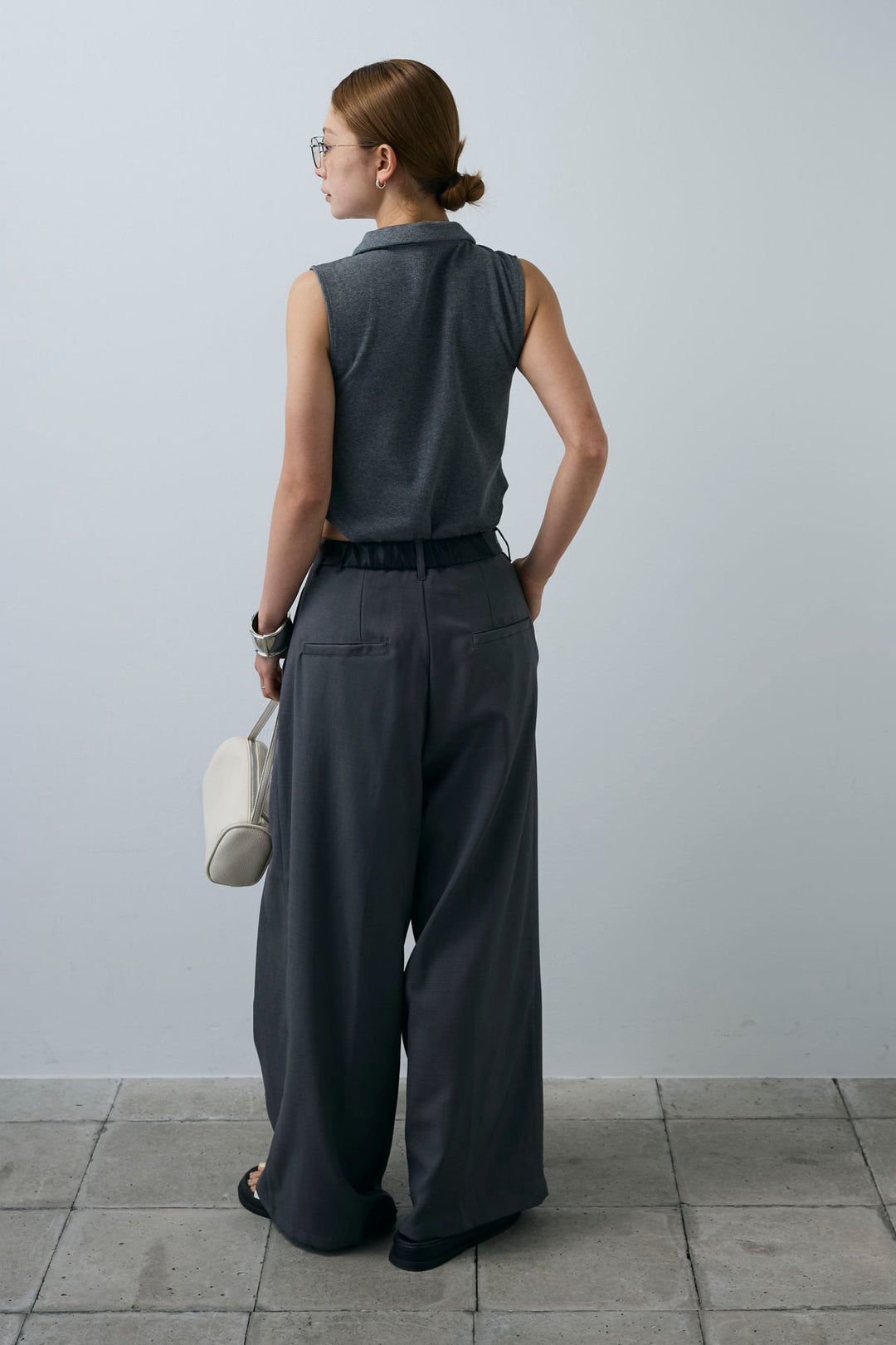 [予約/SET]ポロニットノースリボディースーツ+フェイクレザーベルトセンタータックパンツ(2set)