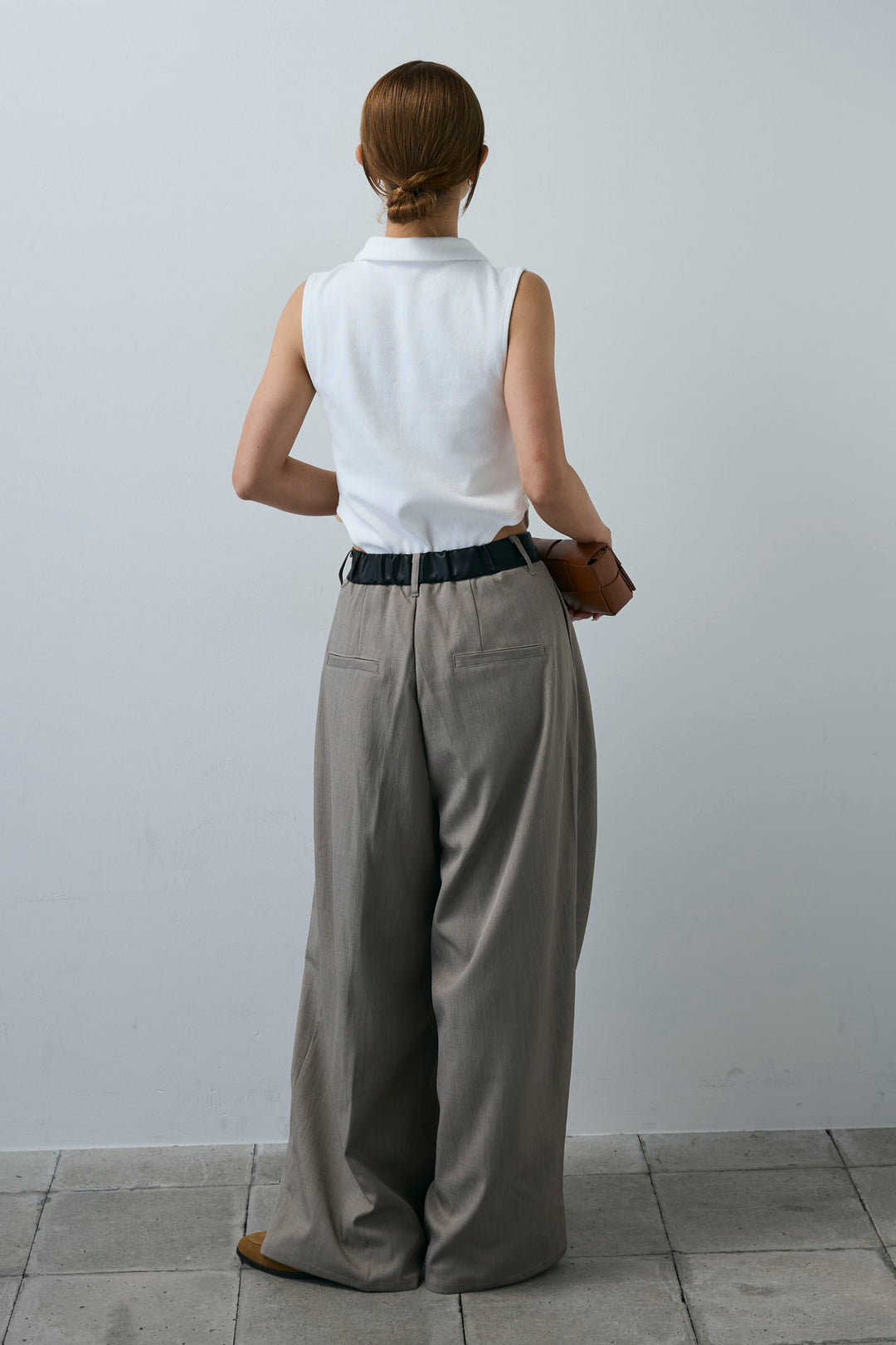 [予約/SET]ポロニットノースリボディースーツ+フェイクレザーベルトセンタータックパンツ(2set)